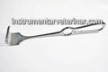 retractor 8 dinti